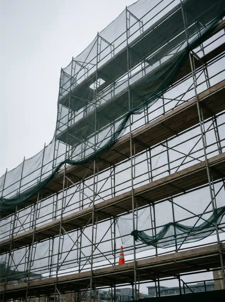 Steel scaffolding rising against an open sky